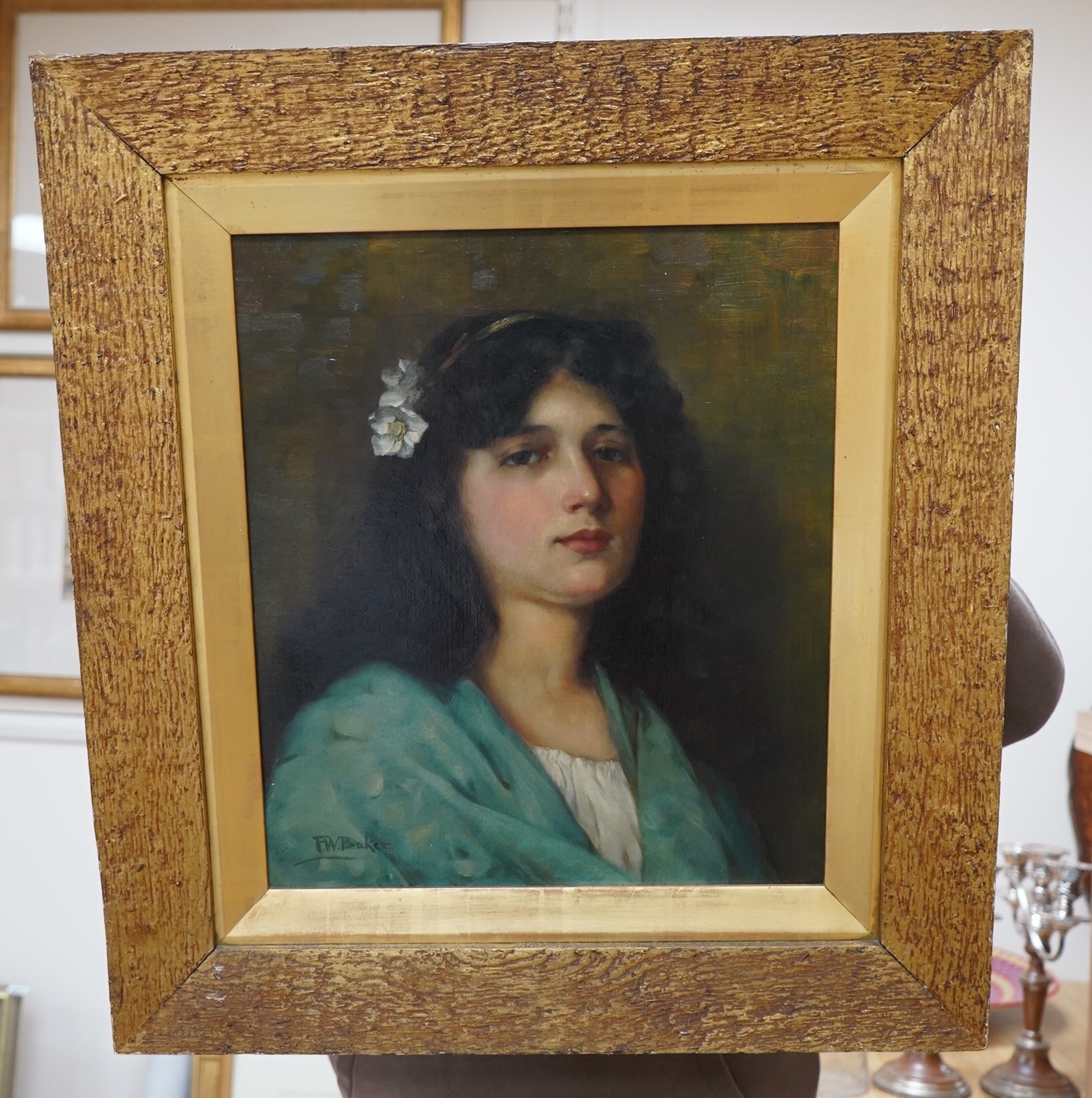 F.W. Baker, oil on canvas, Portrait of a lady, signed, 39 x 34cm, gilt framed. Condition - good